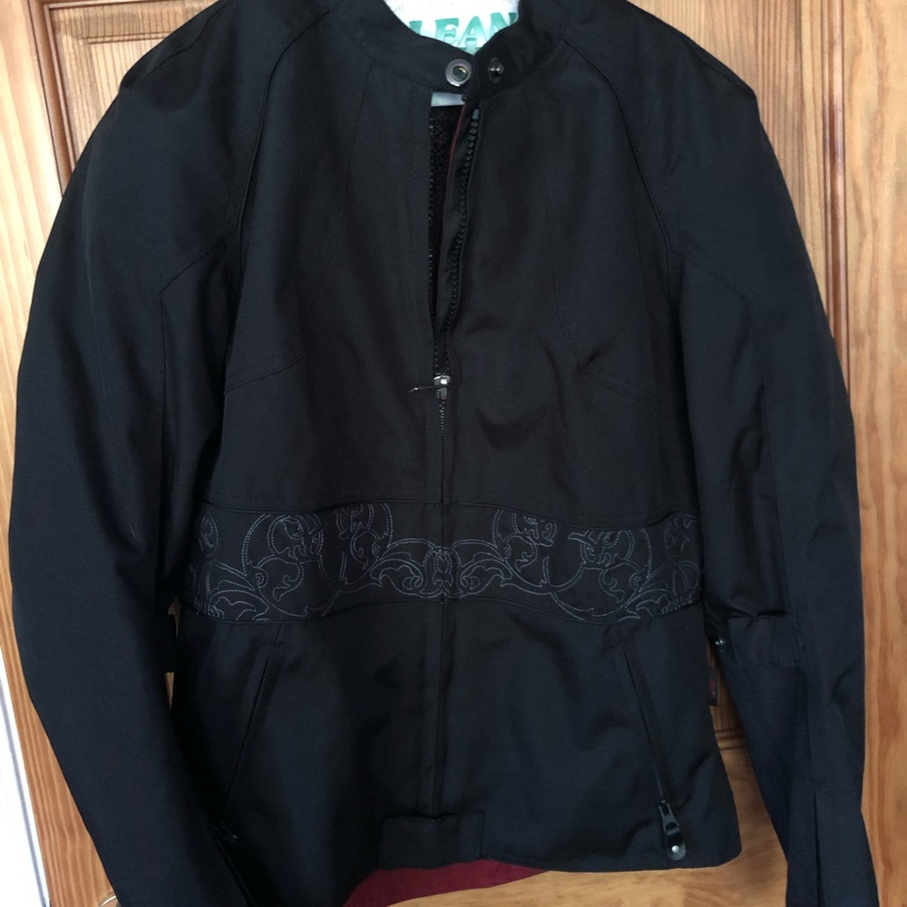 Amazing women’s motorcycle jacket! Brand new